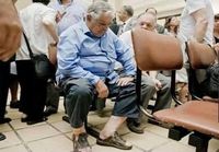 Uruguayn presidentti odottaa vuoroaan terveyskeskuksessa