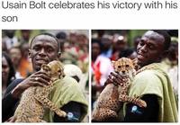 Usain Bolt juhlii voittoaan lapsensa kanssa